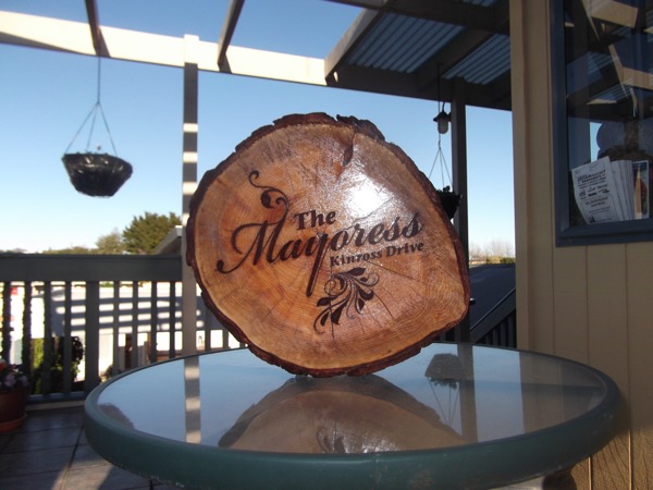 Laser-engraved sliced-timber house sign reading “The Mayoress, Kinross Drive”