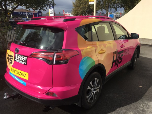 Toyota RAV4 fully wrapped in pink branding for The Hits 89.6 radio station