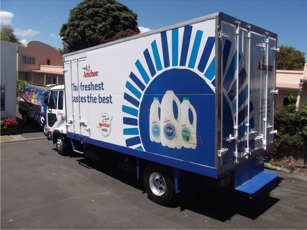 Refrigerated delivery truck wrapped in Anchor milk branding
